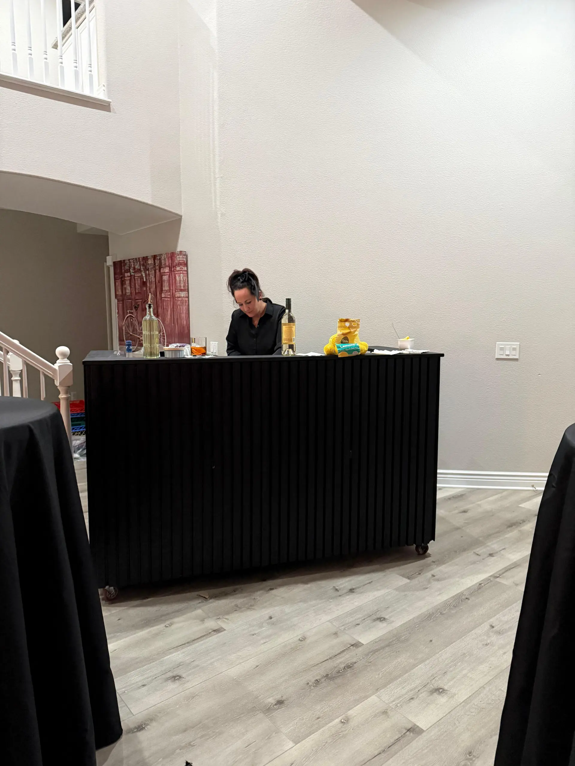 Professional bartender preparing cocktails at a wedding bar
